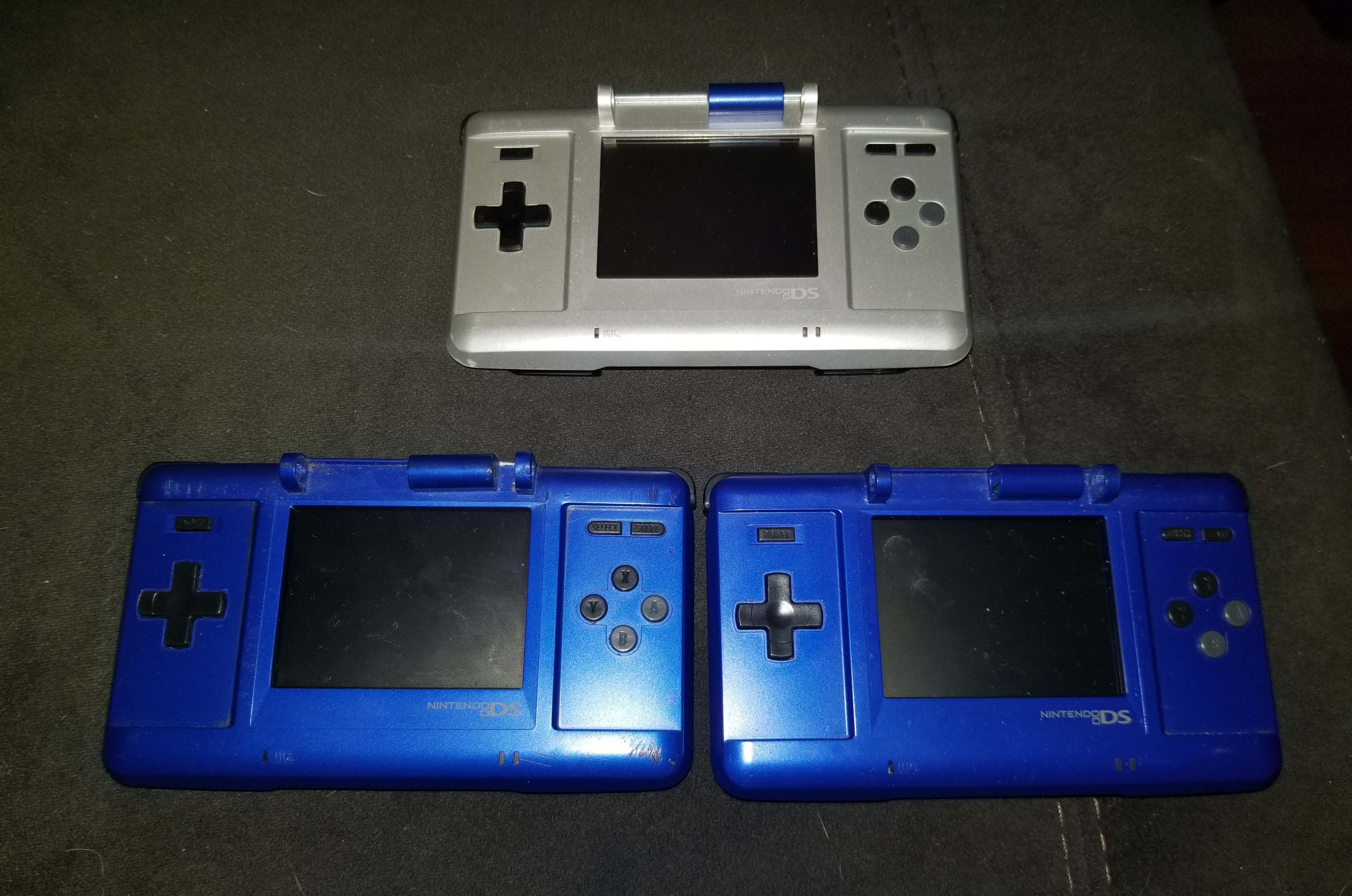 3 modified DS consoles with Loopy capture cards installed. All have been modified to operate without a top screen through the use of a resistor mod. 
